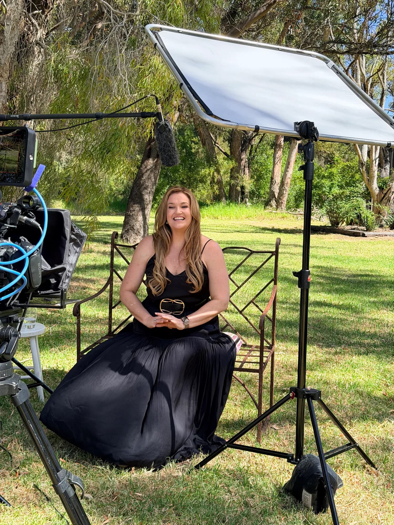 Behind the scenes on the brand film: an interview on the lawn at our Banjup property, with the camera, boom microphone and reflector set up