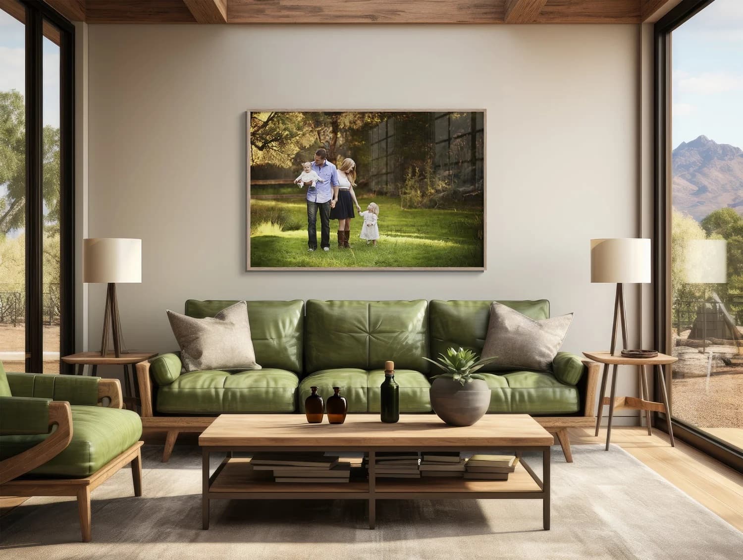 A framed family portrait above a green sofa in a bright living room