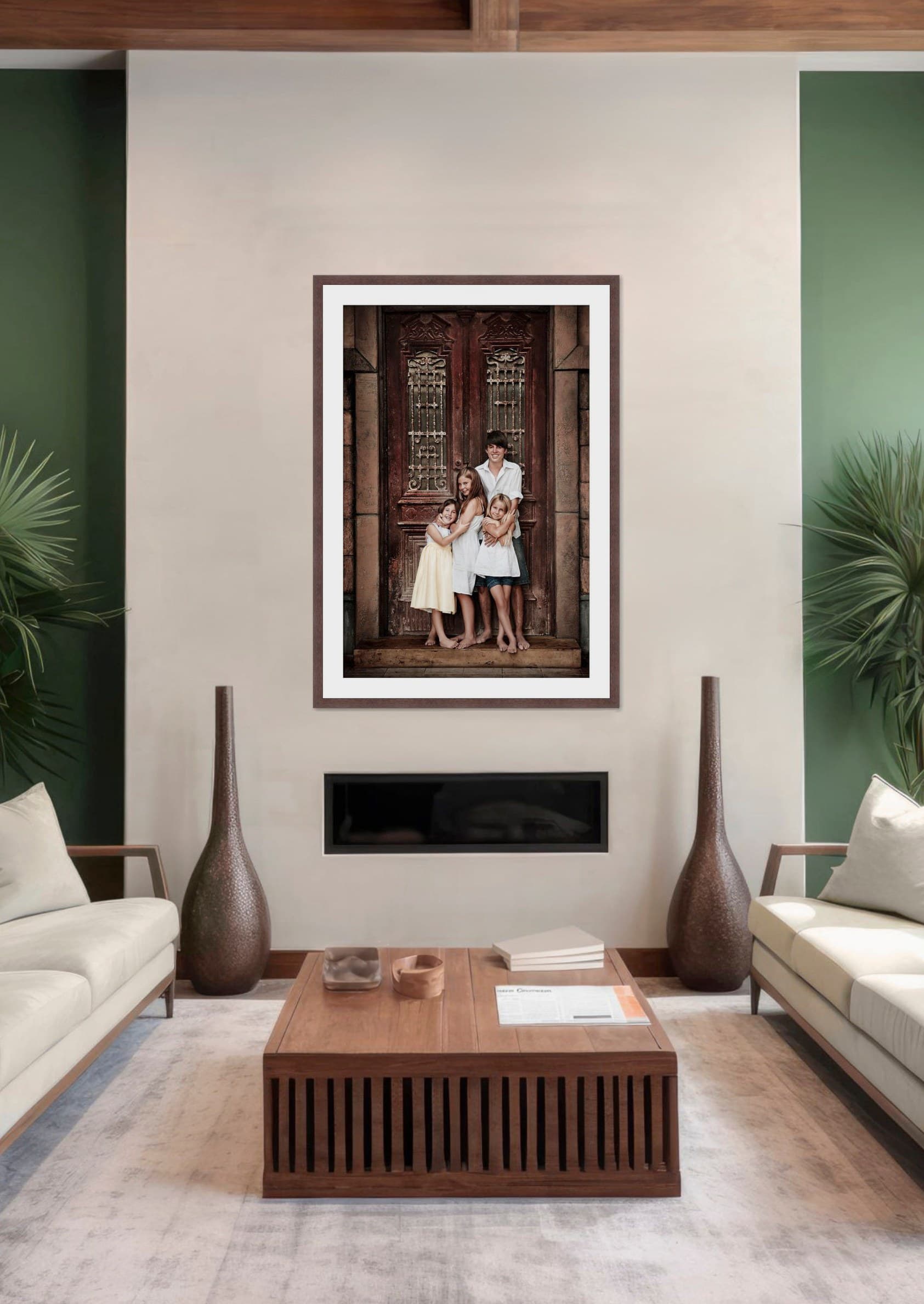 A framed art portrait print displayed on a wall