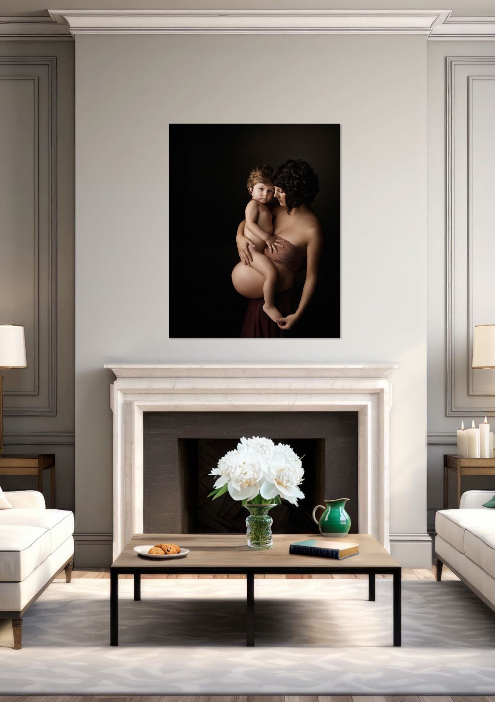 A gallery-wrapped canvas portrait of a mother and child displayed above a fireplace